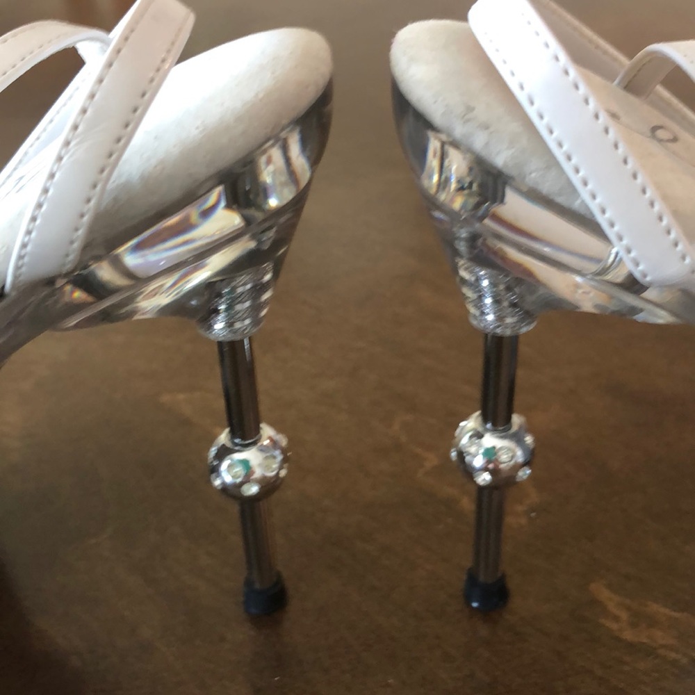 Ellie white heels.